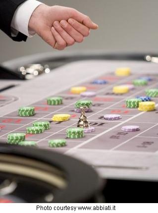 Casino roulette table and bets, player wins.