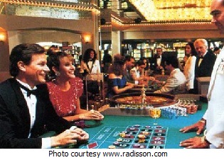 Roulette home page: Players at a roulette table.